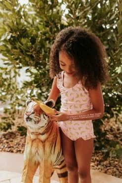 PINK DESERT GIRLS MINI RUFFLE LEG SCOOP ONE PIECE SWIMSUIT IN BUBBLEGUM BANANA