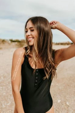 PINK DESERT BUTTON FRONT ONE PIECE IN BLACK