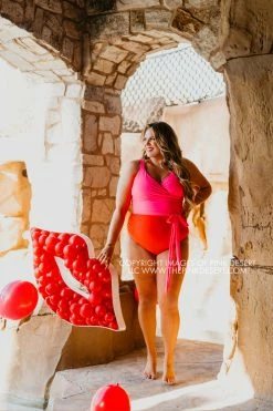 SASSY RED LIPSTICK X PINK DESERT SARAH WRAP ONE PIECE IN VEGAS PINK AND POPPY SWIM