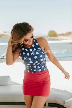 PINK DESERT HIGH NECK RACERBACK ZIPPER MIDKINI SWIM TOP IN SPANGLED STAR PRINT