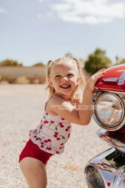 PINK DESERT GIRLS MINI RUFFLE PEPLUM SWIMSUIT SET IN CHERRY BOMB AND CHERRY RED