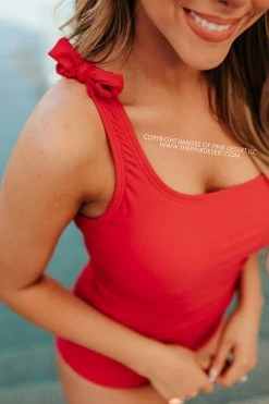 PINK DESERT RUCHED ONE SHOULDER ONE PIECE SWIMSUIT IN CHERRY RED