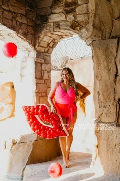 SASSY RED LIPSTICK X PINK DESERT SARAH WRAP ONE PIECE IN VEGAS PINK AND POPPY SWIM