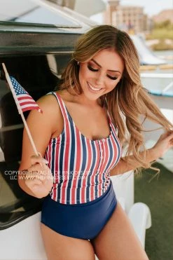 PINK DESERT BUTTON FRONT MIDKINI SWIM TOP IN AMERICANA STRIPE