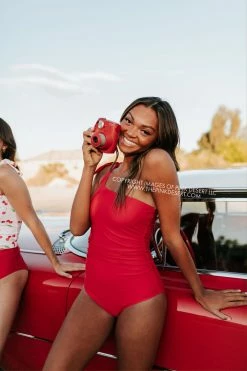 PINK DESERT RUCHED ONE SHOULDER ONE PIECE SWIMSUIT IN CHERRY RED