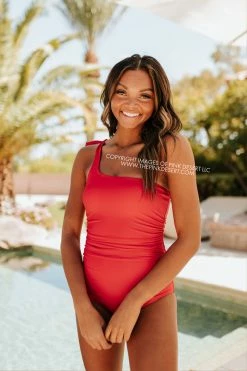 PINK DESERT RUCHED ONE SHOULDER ONE PIECE SWIMSUIT IN CHERRY RED