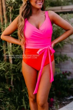 SASSY RED LIPSTICK X PINK DESERT SARAH WRAP ONE PIECE IN VEGAS PINK AND POPPY SWIM