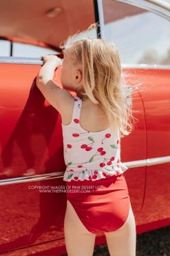 PINK DESERT GIRLS MINI RUFFLE PEPLUM SWIMSUIT SET IN CHERRY BOMB AND CHERRY RED