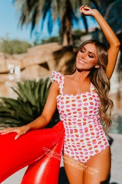 SASSY RED LIPSTICK X PINK DESERT FLUTTER SLEEVE RUCHED ONE PIECE IN SASSY LIPS