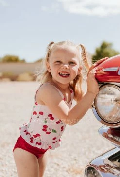 PINK DESERT GIRLS MINI RUFFLE PEPLUM SWIMSUIT SET IN CHERRY BOMB AND CHERRY RED