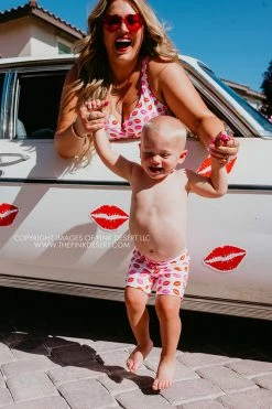 SASSY RED LIPSTICK X PINK DESERT BOYS EUROPEAN CUT SWIM SHORT IN SASSY LIPS