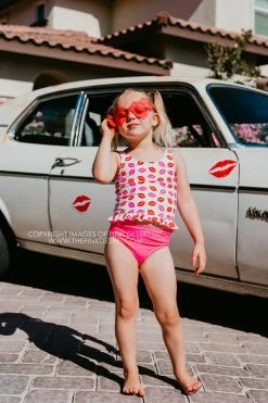 SASSY RED LIPSTICK X PINK DESERT GIRLS MINI RUFFLE PEPLUM SWIMSUIT SET IN SASSY LIPS AND VEGAS PINK