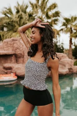 PINK DESERT MINI RUFFLE CROP PEPLUM SWIM TOP IN SNOW LEOPARD