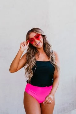 PINK DESERT MINI RUFFLE CROP PEPLUM SWIM TOP IN BLACK 24 PINK DESERT MINI RUFFLE CROP PEPLUM SWIM TOP IN BLACK