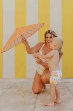 BOYS EUROPEAN CUT SWIM SHORT IN CITRUS PRINT BY SASSY RED LIPSTICK X PINK DESERT