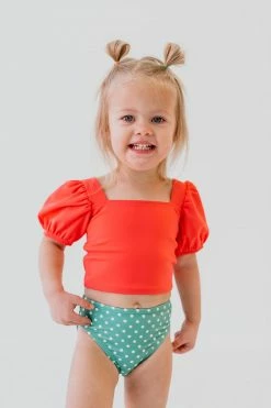GIRLS PUFF SLEEVE SWIM TOP IN BISOU RASPBERRY BY PINK DESERT