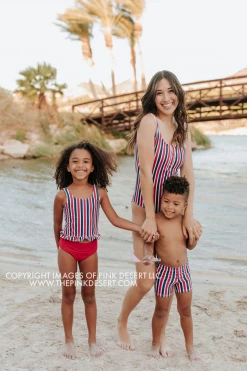 PINK DESERT GIRLS MINI RUFFLE PEPLUM SWIMSUIT SET IN AMERICANA STRIPE AND CHERRY RED