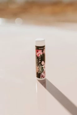 SWIM LE FLEUR PRINT CHAPSTICK BY PINK DESERT