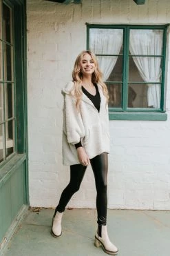 HEM TOPS THE TEDDY ZIP UP PONCHO IN CREAM