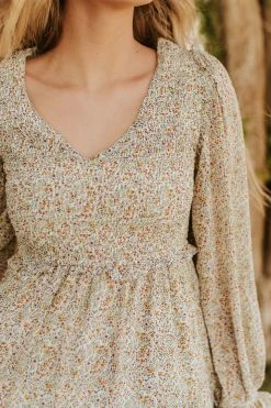 &merci THE PARIS SMOCKED MIDI DRESS IN IVORY PAISLEY DRESSES