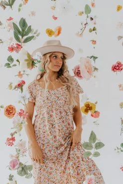 Blu Pepper THE POLLIE FLORAL MIDI DRESS IN LIGHT PINK DRESSES