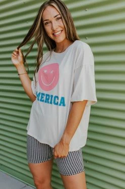 Style U THE AMERICA SMILEY GRAPHIC TEE IN SAND TOPS