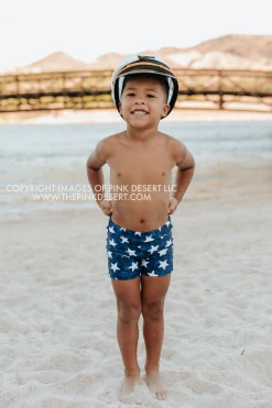 PINK DESERT BOYS EUROPEAN CUT SWIM SHORT IN SPANGLED STAR PRINT