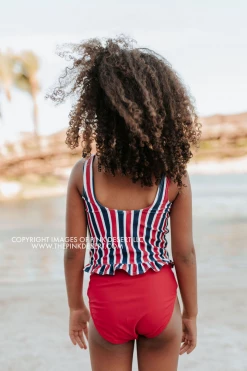 PINK DESERT GIRLS MINI RUFFLE PEPLUM SWIMSUIT SET IN AMERICANA STRIPE AND CHERRY RED
