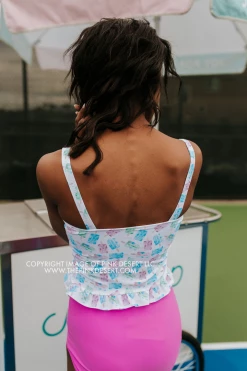 PINK DESERT MINI RUFFLE CROP PEPLUM SWIM TOP IN POPSICLE