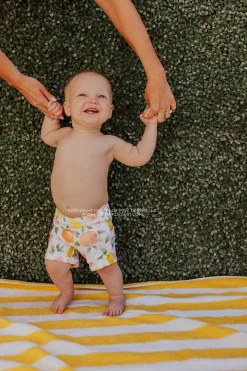 BOYS EUROPEAN CUT SWIM SHORT IN CITRUS PRINT BY SASSY RED LIPSTICK X PINK DESERT