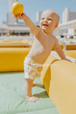 BOYS EUROPEAN CUT SWIM SHORT IN CITRUS PRINT BY SASSY RED LIPSTICK X PINK DESERT