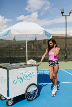 PINK DESERT MINI RUFFLE CROP PEPLUM SWIM TOP IN NEON LILAC