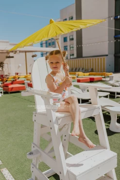 GIRLS MINI RUFFLE LEG SCOOP ONE PIECE SWIMSUIT IN CITRUS PRINT BY SASSY RED LIPSTICK X PINK DESERT