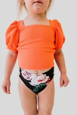 GIRLS PUFF SLEEVE SWIM TOP IN RIBBED PEACHBERRY BY PINK DESERT