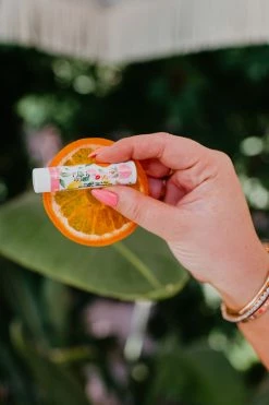 CITRUS PRINT CHAPSTICK BY SASSY RED LIPSTICK X PINK DESERT SWIM