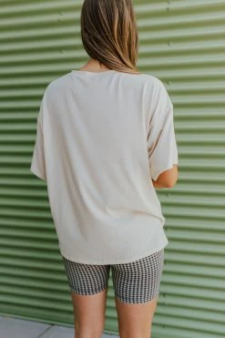 Style U THE AMERICA SMILEY GRAPHIC TEE IN SAND TOPS